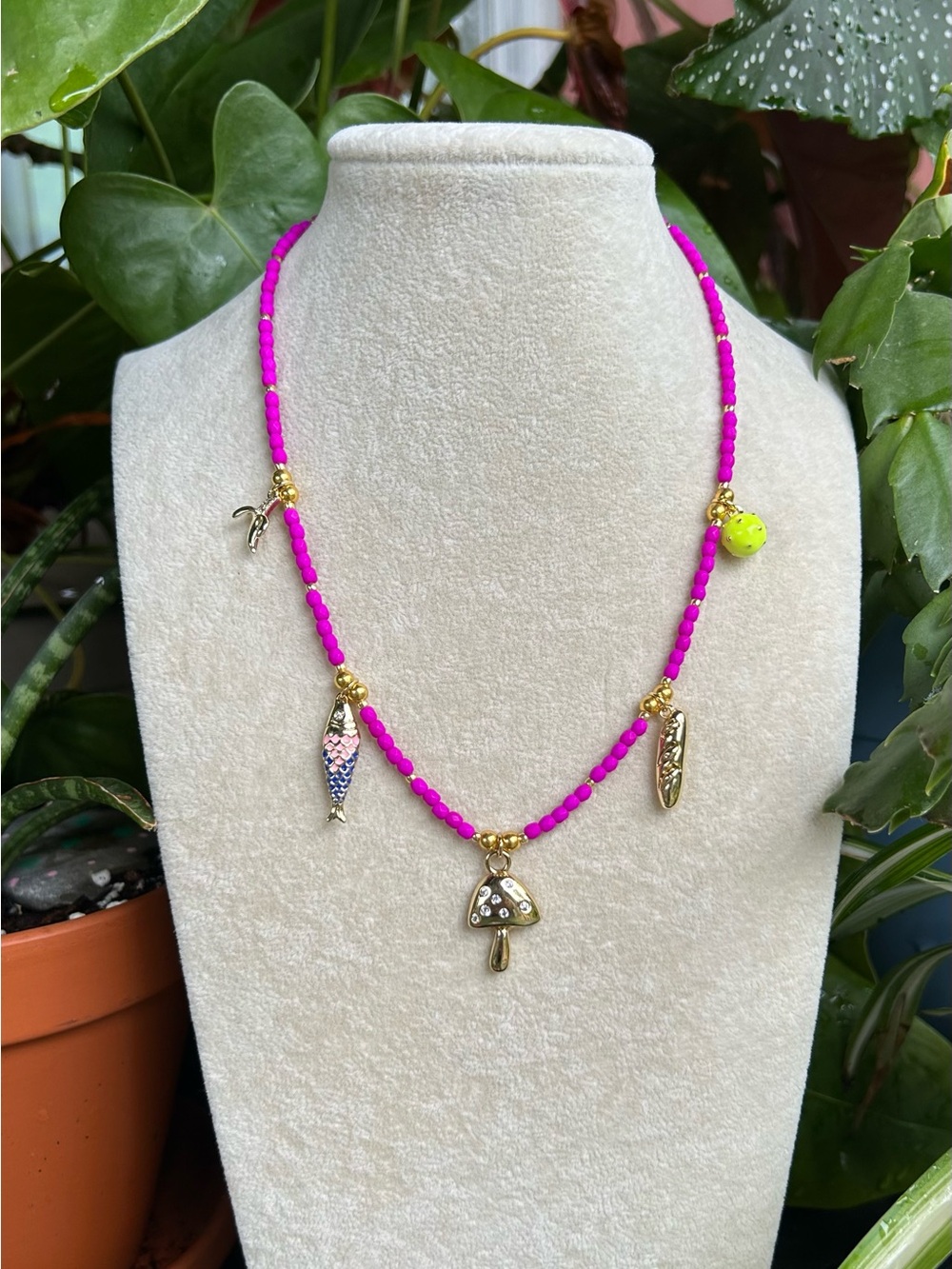 Pink charm necklace